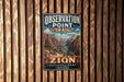 A vintage metal sign for Observation Point Trail in Zion National Park, Utah.