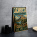 A vintage-style metal sign for Ochoco National Forest in Oregon, featuring a scenic mountain landscape and the text "Explore Nature" and "Adventure Awaits".