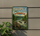 A vintage-style sign for Ohio State Park, Pennsylvania, featuring a scenic image of a waterfall and forest.