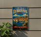 A vintage metal sign with the text "Old City of Dubrovnik, Croatia" and a picture of the city's skyline, along with the text "The Pearl of the Adriatic".