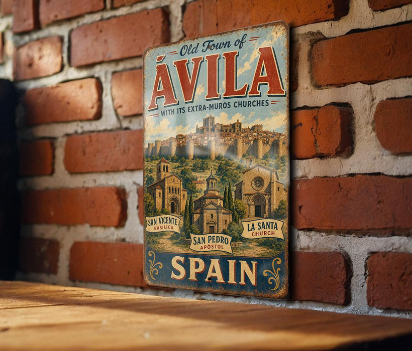 A vintage metal sign with the text "Old Town of Avila" and "Spanish churches" hanging on a brick wall.
