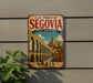 a vintage metal sign that reads "Old Town of Segovia & Its Aqueduct" and "Spain", with a picture of a historic bridge in the background.