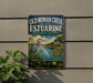 a vintage-style sign for the Old Woman Creek National Estuarine Research Reserve in Ohio.