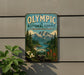 A vintage-style metal sign for the Olympic National Forest in Washington, featuring a scenic mountain landscape with pine trees, a river, and flowers.