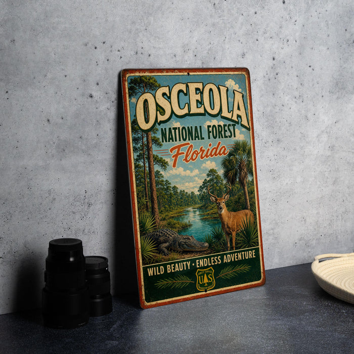 A vintage-style metal sign for the Osceola National Forest in Florida, featuring a scenic illustration of a forest, a deer, and a crocodile.