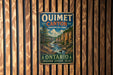 A vintage metal sign for Ontario, Canada, displaying the name "Oumet Canyon" and the words "Discover, Explore, Relax" in a scenic illustration of the canyon.