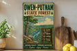 A vintage-style sign for Owen-Putnam State Forest, Indiana, featuring a scenic illustration of the forest and a list of outdoor activities.