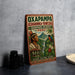 A vintage-style sign for the Oaxaca-Yanesta Biosphere Reserve in Peru, featuring an illustration of a native Peruvian man surrounded by lush tropical foliage and wildlife.