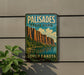A vintage-style metal sign for Palisades State Park in South Dakota, featuring a scenic mountain landscape with a lake and clouds in the background.