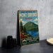 A vintage-style sign for the PARC NATIONAL DU MONT-ORFORD QUEBEC, featuring a mountain landscape with a lake and pine trees.