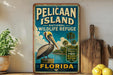 A vintage-style sign for Pelican Island National Wildlife Refuge in Florida, featuring a pelican and palm trees, is displayed on a shelf next to a wooden cutting board and some lemons.