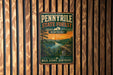 A vintage-style metal sign for the Pennyville State Forest in Kentucky, featuring a scenic landscape with a river, trees, and a sunset.