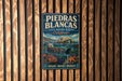 A vintage metal sign for Piedras Blancas State Marine Reserve, California, featuring an illustration of an octopus and other marine life.