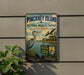 A vintage-style metal sign for the Pinchney Island National Wildlife Refuge in South Carolina, featuring illustrations of birds and a serene landscape.