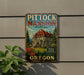 A vintage-style metal sign for Pitock Mansion in Portland, Oregon, featuring a large illustration of the mansion surrounded by trees and mountains.