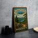A vintage-style sign for the Pitfield State Forest in Massachusetts, featuring a scenic landscape with pine trees, a lake, and mountains.