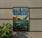 A vintage-style sign for Point Reyes National Seashore Marine Zone, featuring a lighthouse, seabirds, and a coastal landscape.