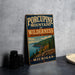 A vintage-style sign for Porcupine Mountains Wilderness State Park in Michigan, featuring a scenic landscape with mountains, forests, and a lake.