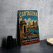 A vintage travel poster for Cartagena, Colombia, featuring the city's fortresses and monuments, with a boat on the water.