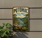 A vintage-style metal sign for Potomac State Forest in Maryland, featuring a scenic landscape with a river, mountains, and trees.