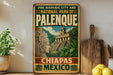 A vintage-style sign for the National Park of Palenque, Mexico, featuring an illustration of a Mayan temple surrounded by lush tropical foliage.