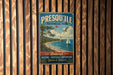 A vintage-style metal sign for Presqu' Isle Provincial Park, featuring a scenic illustration of a beach, lighthouse, and sailboat.