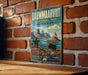 a vintage-style metal sign with a scenic landscape depicting a polar bear, mountains, and a lake, mounted on a brick wall.