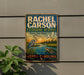 A vintage-style sign for Rachel Carson Estuarine Reserve in North Carolina, featuring illustrations of birds, a heron, and a turtle in a natural setting.