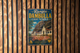 A vintage-style metal sign with the text "Rangiri Dambulla Cave Temple" and "Sri Lanka" is displayed on a wooden wall.
