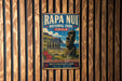 a vintage-style metal sign with the text "RAPA NUI NATIONAL PARK CHILE" and an illustration of Easter Island's Moai statues.