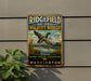A vintage metal sign for the Ridgefield National Wildlife Refuge, featuring a duck in flight and a scenic landscape.