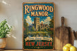A vintage-style metal sign for Ringwood Manor, featuring a castle and a lake, is displayed on a shelf next to a wooden cutting board and some lemons.