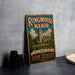A vintage-style metal sign for Ringwood Manor, featuring a castle and a lake, is displayed on a gray countertop.