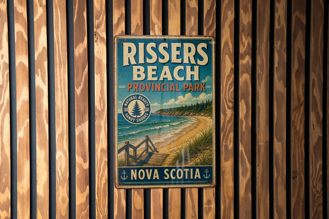 A vintage-style metal sign for Rissers Beach, a coastal park in Nova Scotia, Canada.