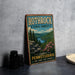 A vintage-style metal sign for Rothrock State Forest in Pennsylvania, featuring a scenic landscape with pine trees, a river, and pink flowers.