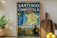 a vintage-style metal sign with a map of France, depicting a man walking along a path, surrounded by landmarks and a scenic view.
