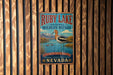 A vintage-style metal sign for Ruby Lake National Wildlife Refuge in Nevada, featuring a bird and a scenic landscape.