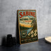 A vintage-style sign for Sabine National Forest in Texas, featuring a scenic illustration of pine woods, lakes, and adventure opportunities.