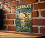 A vintage metal sign for the Sacramento National Wildlife Refuge in California, featuring an illustration of birds and a serene landscape.