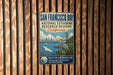 A vintage-style sign for the San Francisco Bay National Estuarine Research Reserve in California, featuring an illustration of the Golden Gate Bridge and a bird.