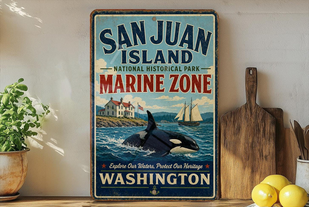 A vintage-style sign for San Juan Island National Historical Park, featuring an illustration of a whale, a lighthouse, and a ship, along with the text "San Juan Island Marine Zone Washington".
