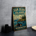 A vintage-style metal sign for San Juan Islands, Washington, featuring a lighthouse and orca whale in the ocean.
