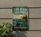 A vintage-style metal sign for San Juan Islands, Washington, featuring a scenic landscape with mountains, a lighthouse, and two orca whales in the water.