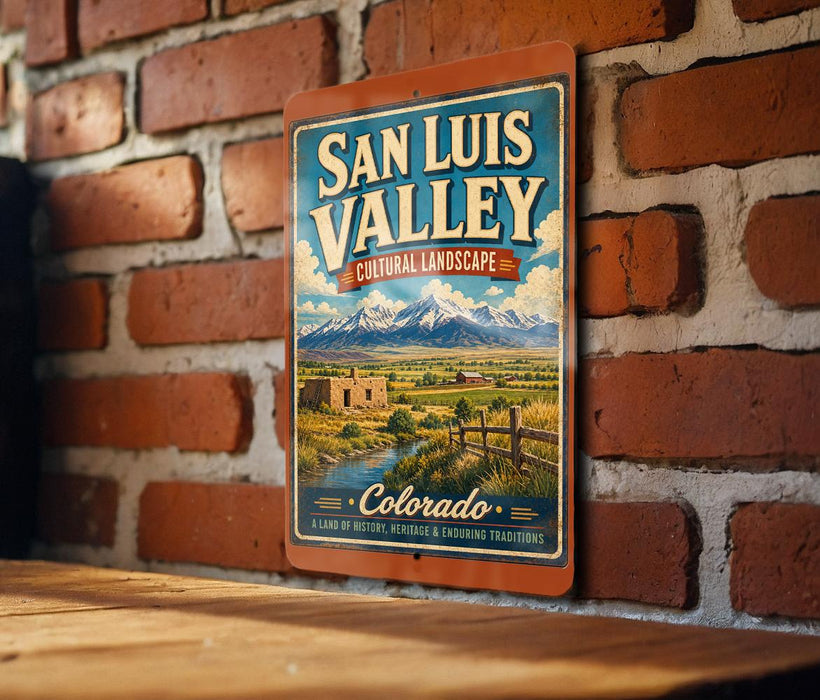 A vintage-style metal sign for San Luis Valley, Colorado, featuring a scenic landscape with mountains, a river, and a small town.