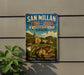 a vintage-style sign with a castle and mountains in the background, mounted on a wall.