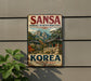 A vintage-style sign for the Buddhist Mountain Monasteries in South Korea, featuring a scenic mountain landscape with traditional Korean buildings.