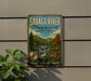 A vintage metal sign for Savage River State Forest in Maryland, featuring a scenic image of a waterfall and forest.