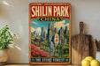 A vintage-style sign for Shilin Park, China, featuring a scenic landscape with mountains, a pagoda, and a stone forest.