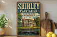 a vintage-style sign for Shirley Plantation, which is described as America's oldest plantation in Virginia. The sign is displayed on a shelf next to a wooden cutting board and a potted plant.