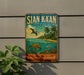 A vintage-style metal sign with the text "SIAN KÁAN MEXICO" and an illustration of a tropical beach scene with a bird, turtle, and palm trees.